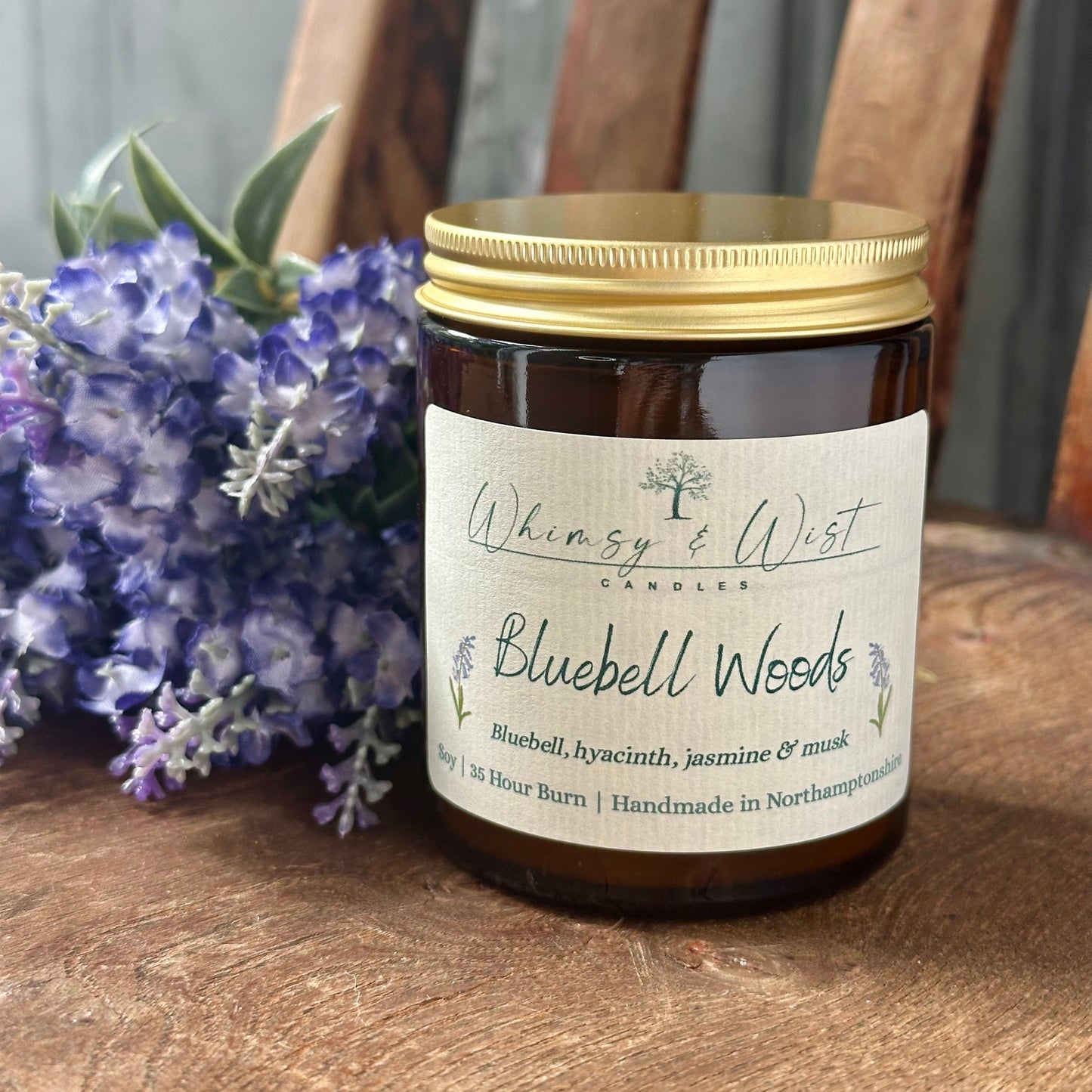 Bluebell Woods soy candle in amber apothecary jar with gold lid, handmade in the UK.