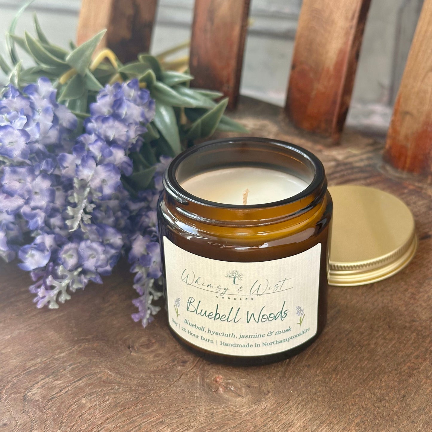 Bluebell Woods soy candle in amber apothecary jar with gold lid, handmade in the UK.