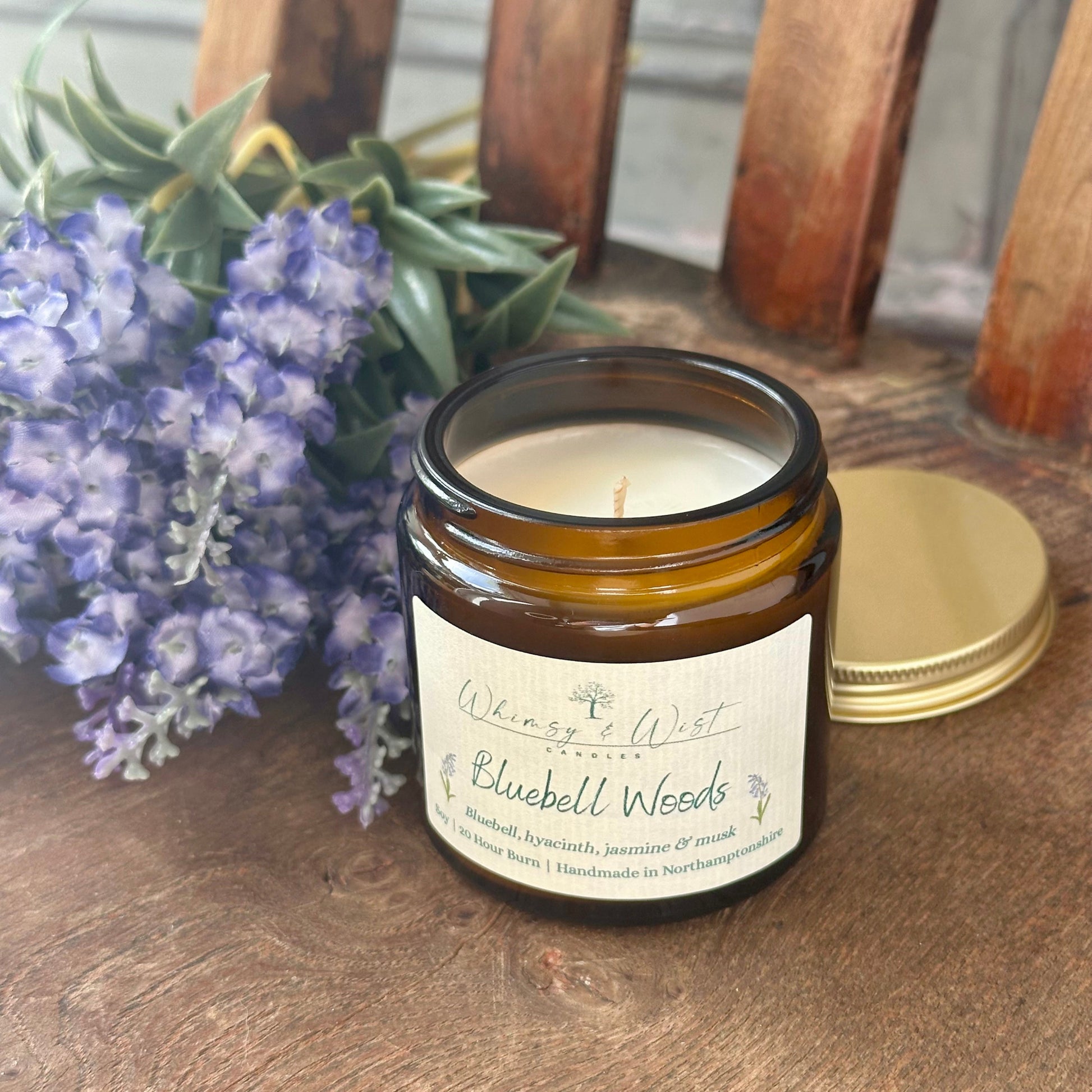 Bluebell Woods soy candle in amber apothecary jar with gold lid, handmade in the UK.