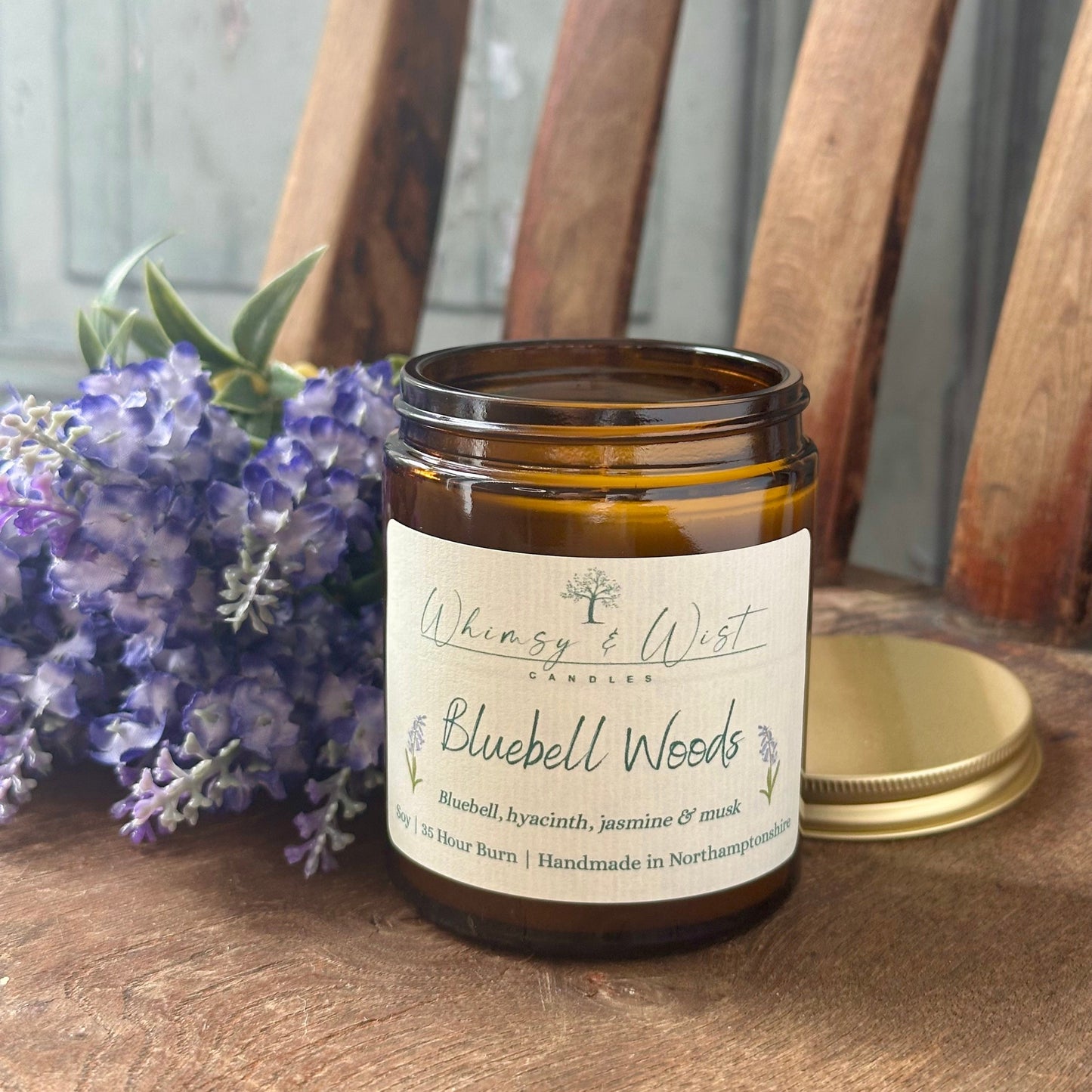 Bluebell Woods soy candle in amber apothecary jar with gold lid, handmade in the UK.