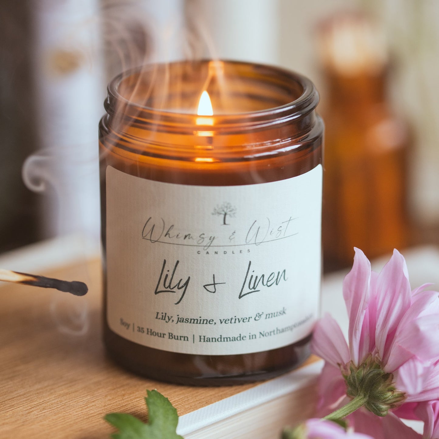 Lily & Linen soy wax candle in amber glass jar – clean floral spring scent