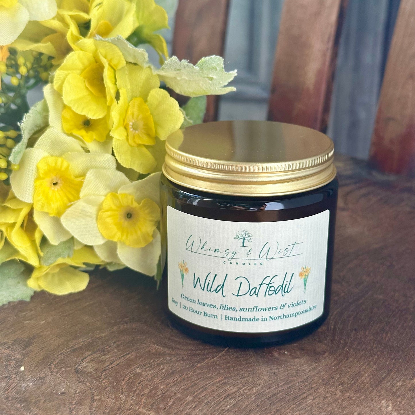 Wild Daffodil soy candle in amber apothecary jar with gold lid, handmade in the UK.
