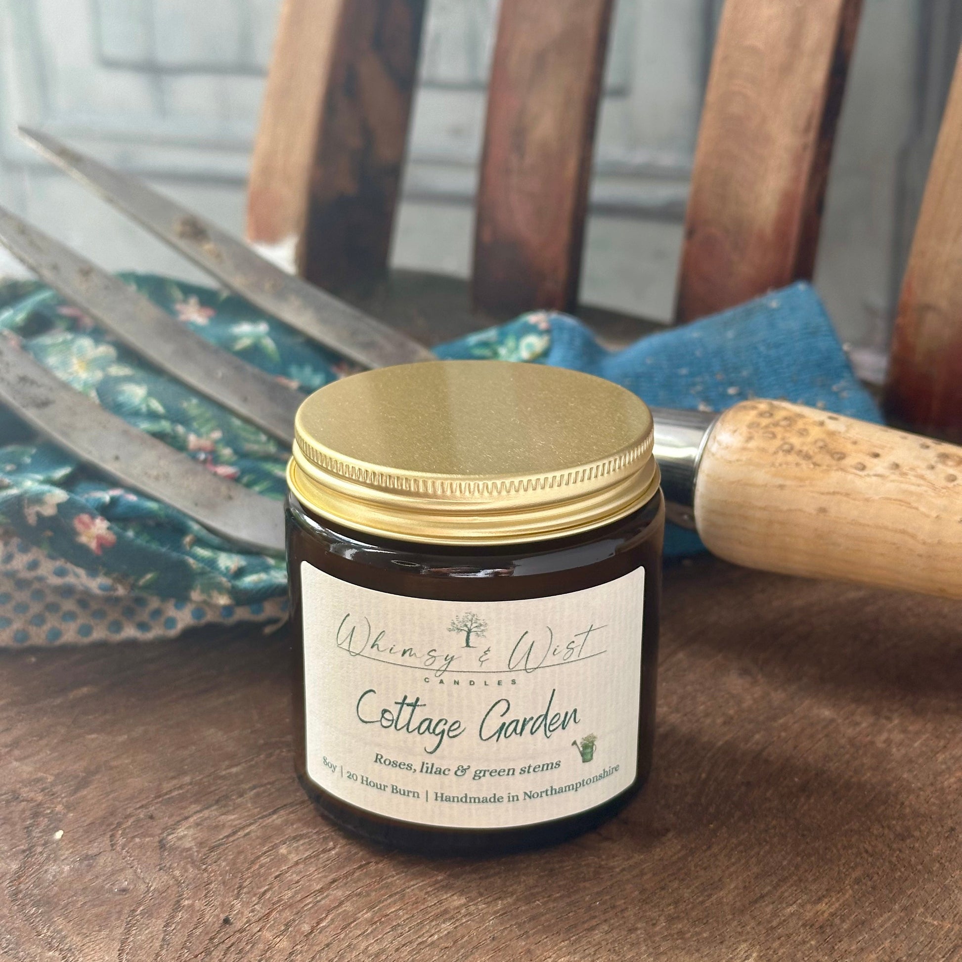 Cottage Garden soy candle in amber apothecary jar with gold lid, handmade in the UK.