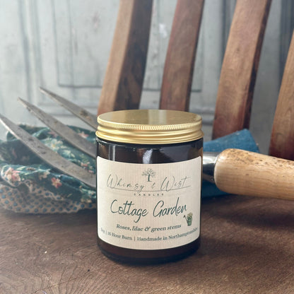 Cottage Garden soy candle in amber apothecary jar with gold lid, handmade in the UK.