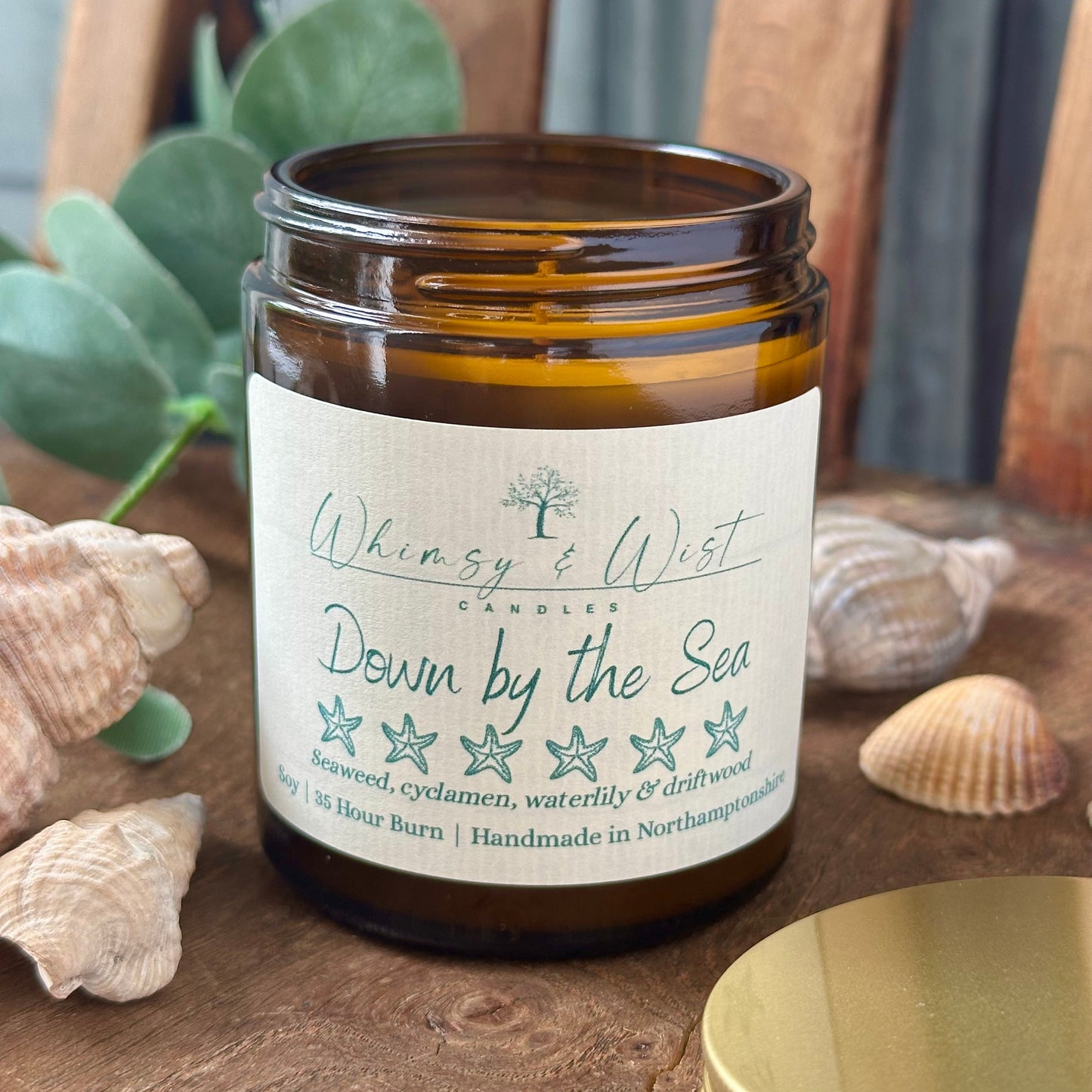 Down by the Sea soy candle in amber apothecary jar with gold lid, handmade in the UK.