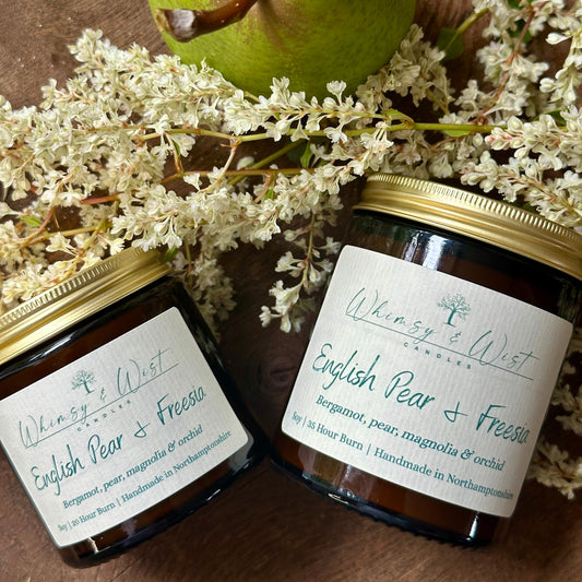 English Pear & Freesia soy candle in amber apothecary jar with gold lid, handmade in the UK.