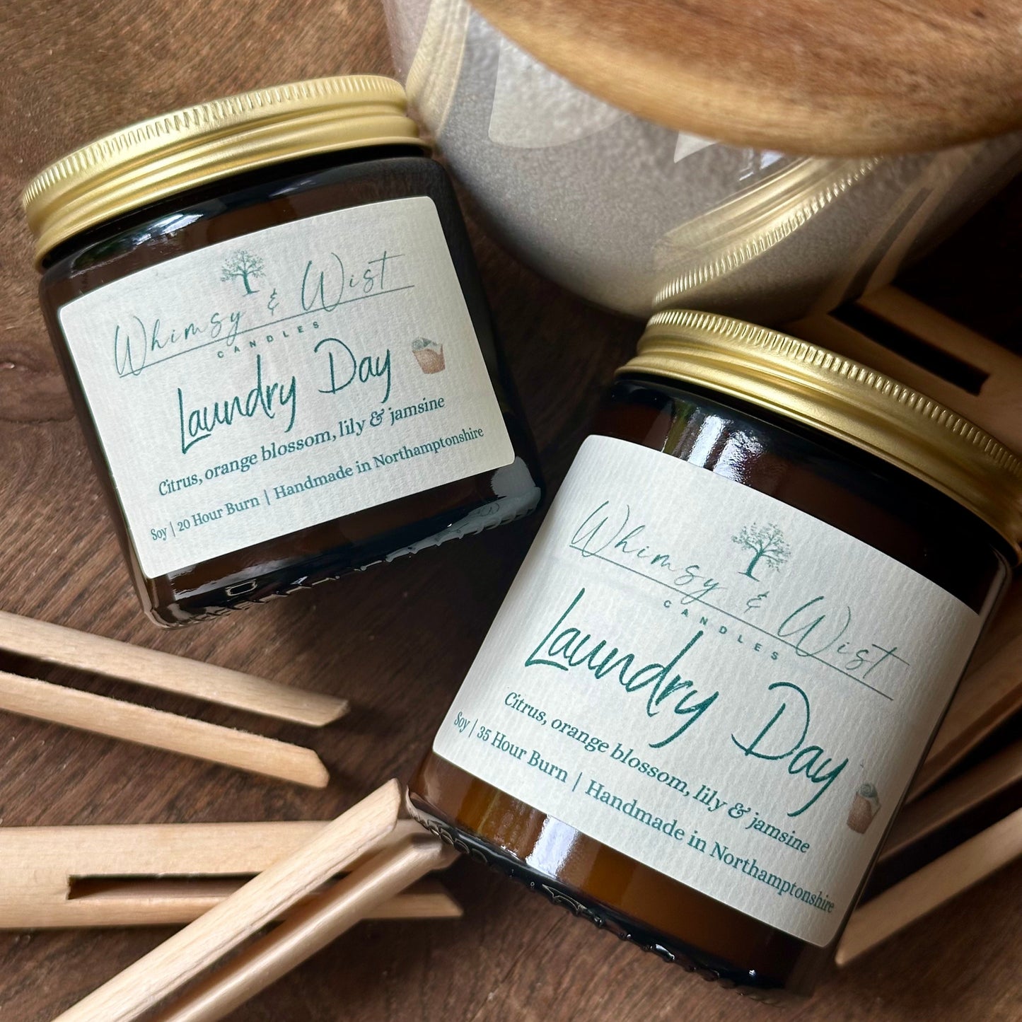 Laundry Day soy candle in amber apothecary jar with gold lid, handmade in the UK.