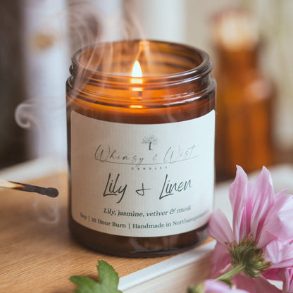 Lily & Linen soy wax candle in amber glass jar – clean floral spring scent