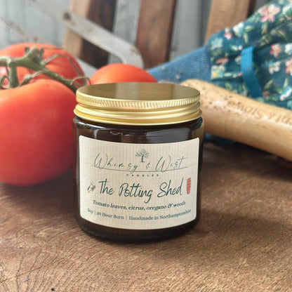 The Potting Shed soy candle in amber apothecary jar with gold lid, handmade in the UK.