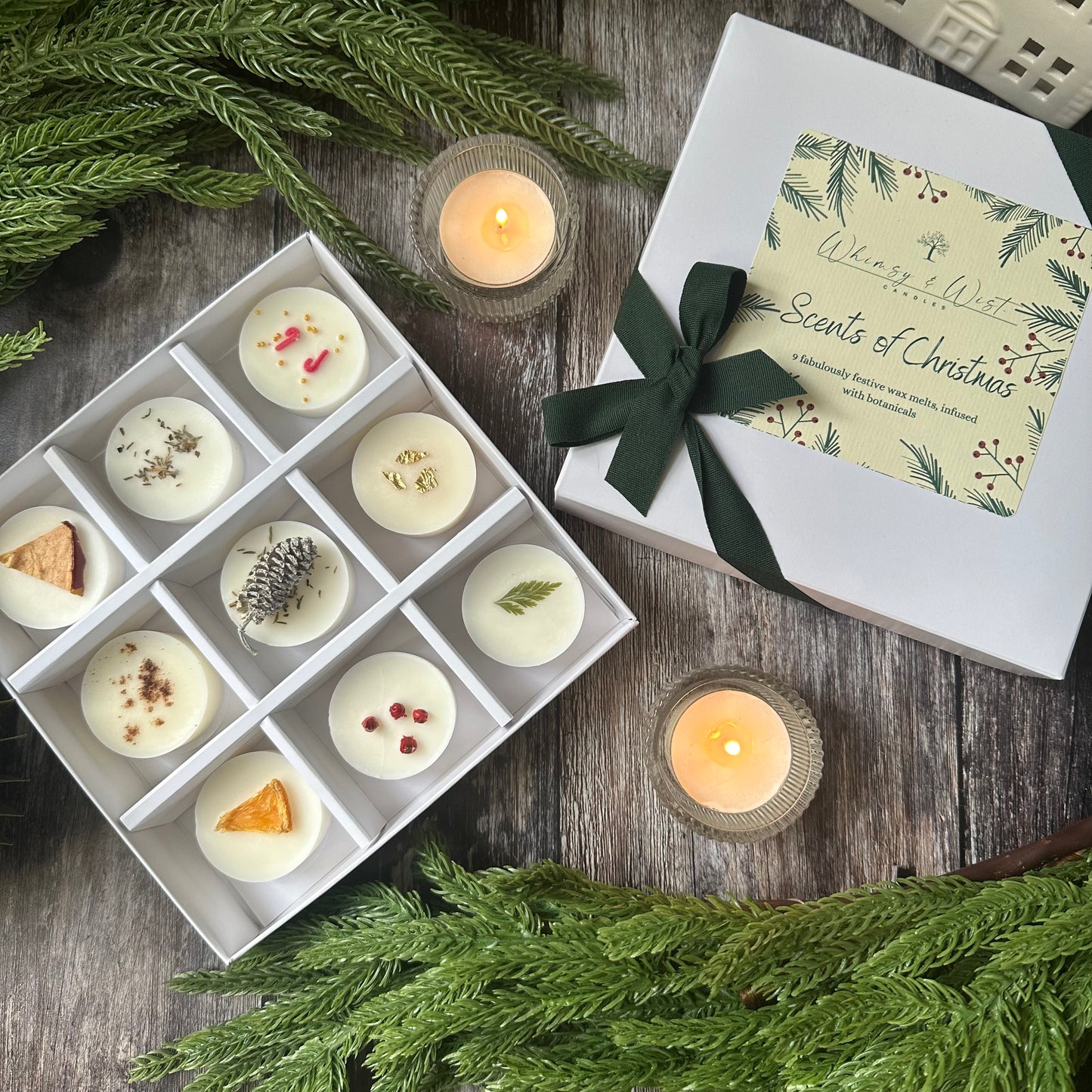 A box of 9 hand finished wax melts in festive scents
