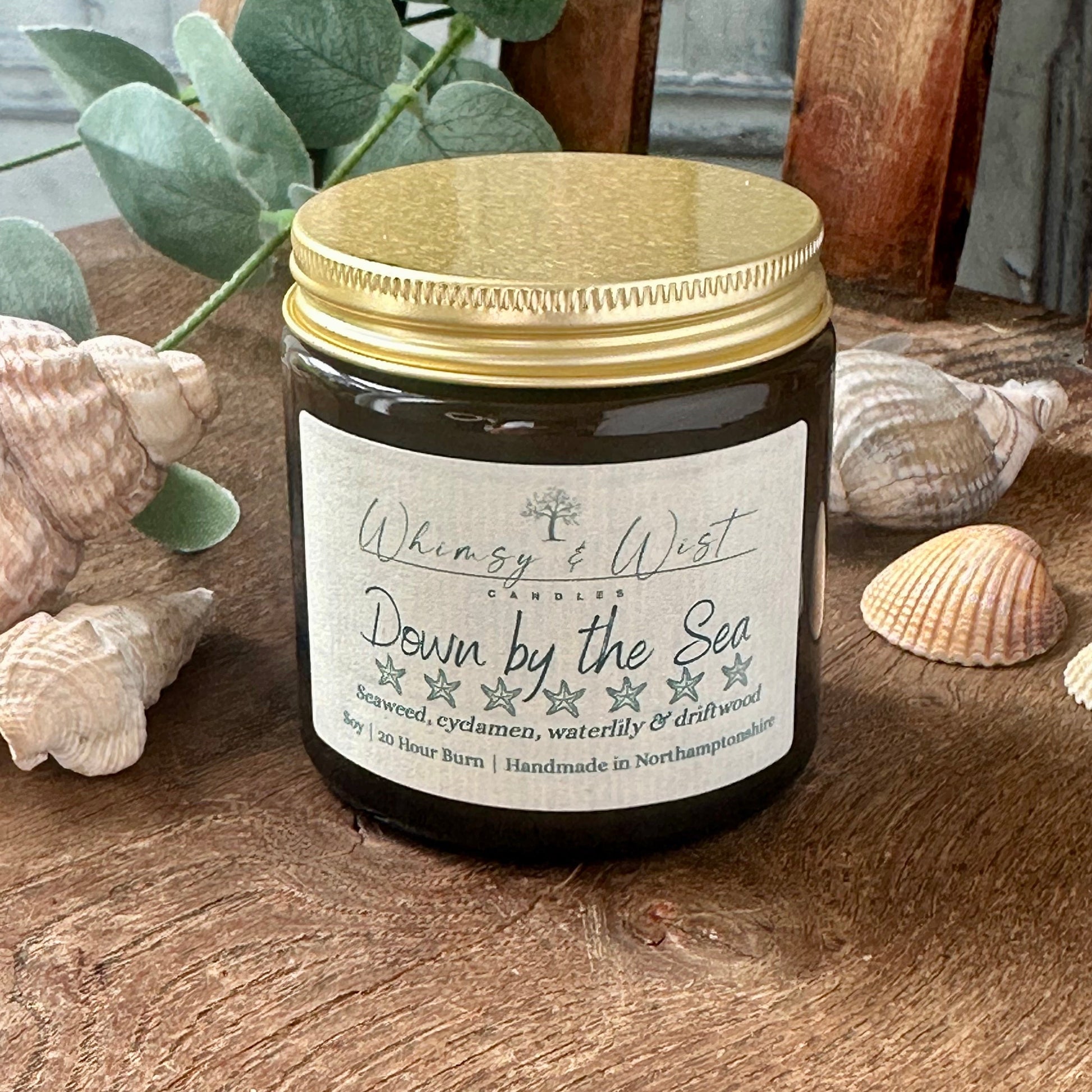 Down by the Sea soy candle in amber apothecary jar with gold lid, handmade in the UK.