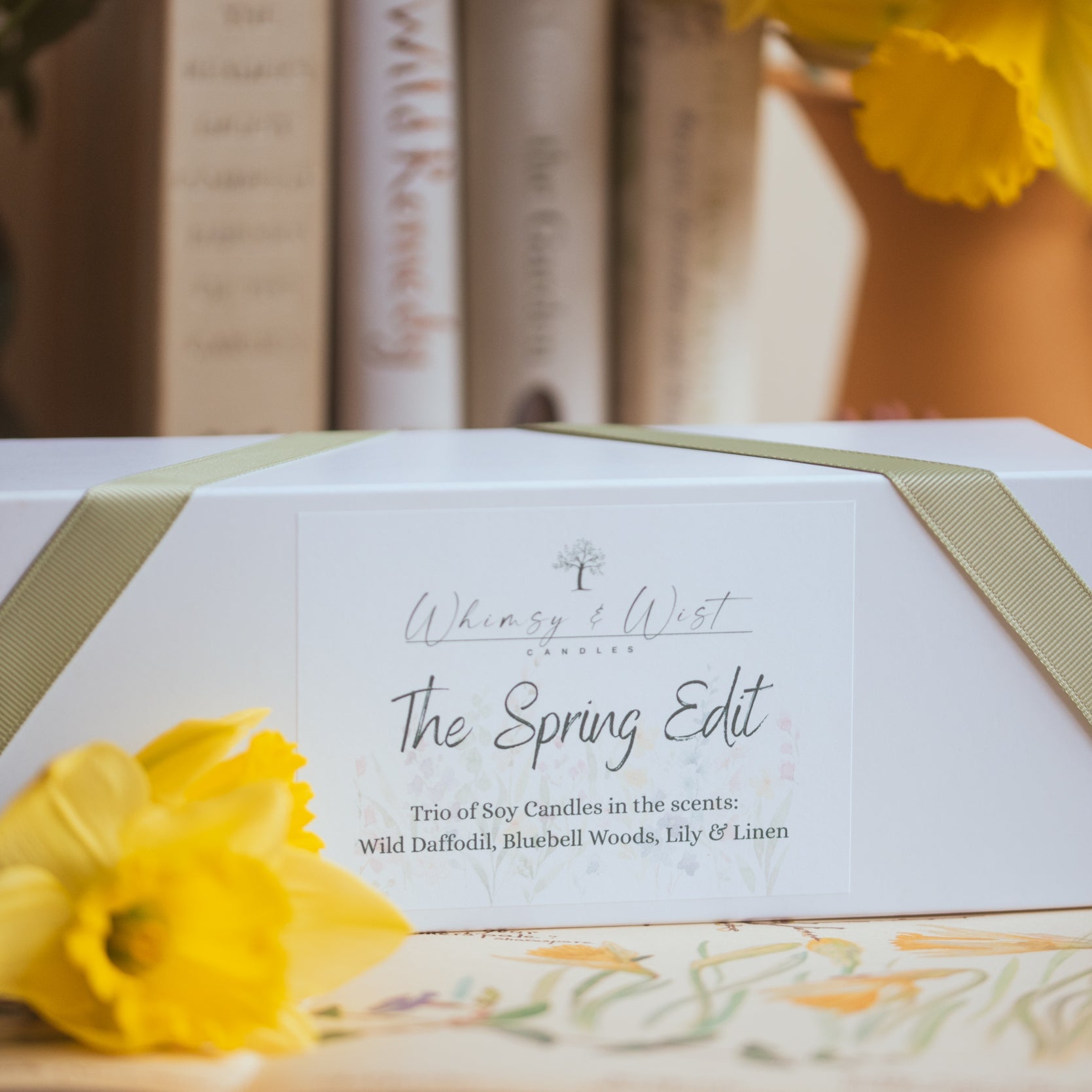 Spring candle gift box styled with fresh flowers and pastel tones