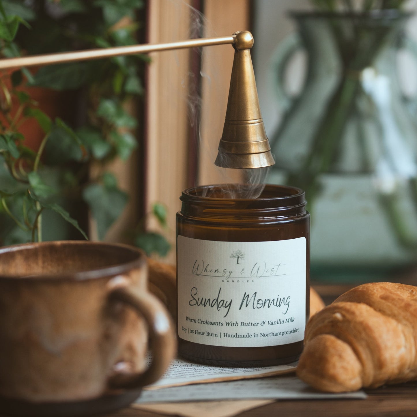 Croissant scented candle being snuffed out