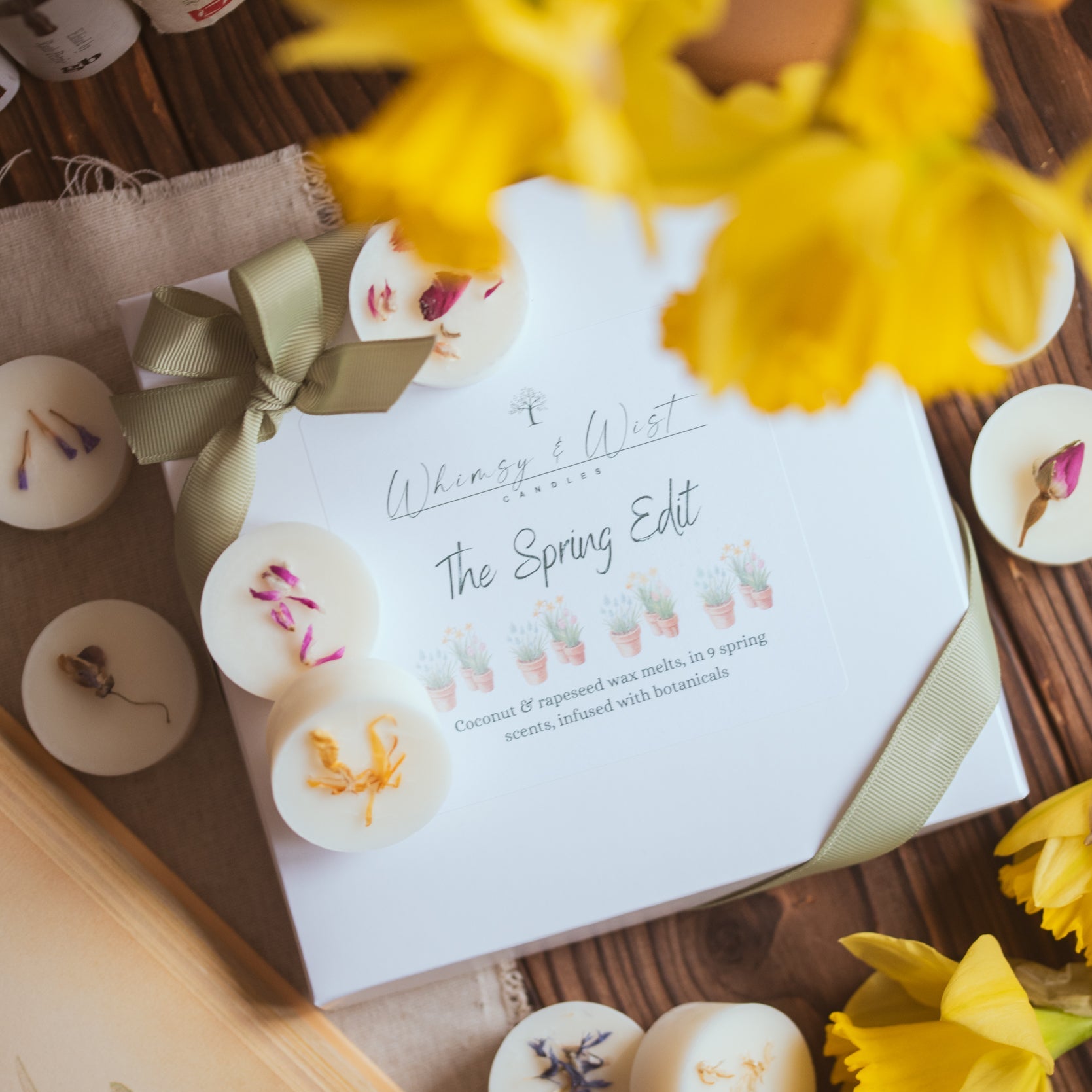 Spring wax melts styled with flowers and linen in natural light