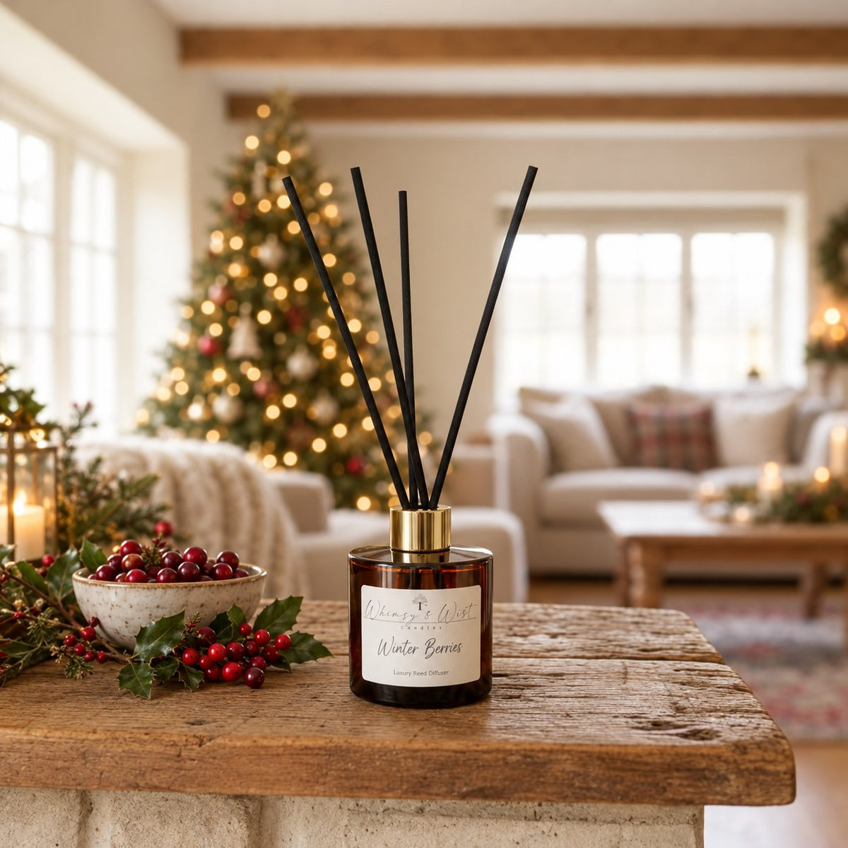 Whimsy & Wist Winter Berries reed diffuser on a rustic table with a bowl of cranberries and red winter berries